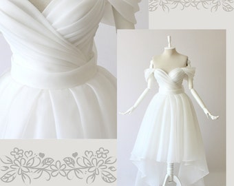 Draped wedding dress,Short dress,Medium length dress,Princess dress,White dress,Ball gown,Plain white dress.