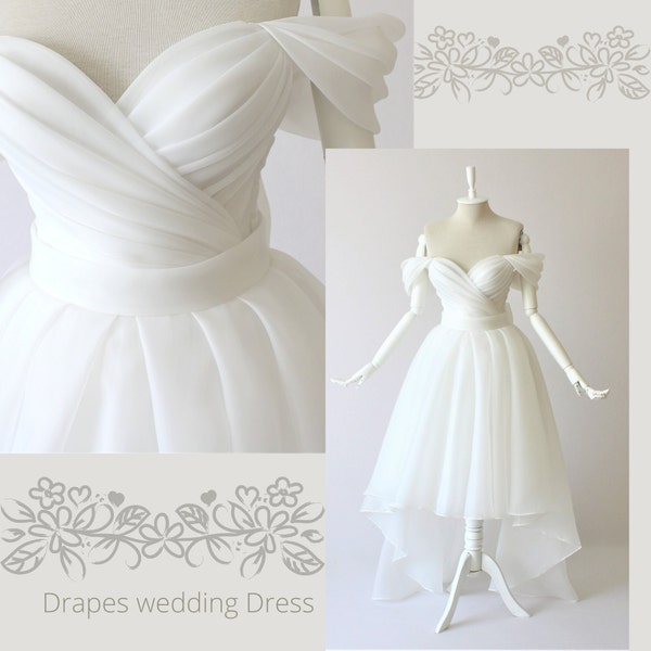 Draped wedding dress,Short dress,Medium length dress,Princess dress,White dress,Ball gown,Plain white dress.