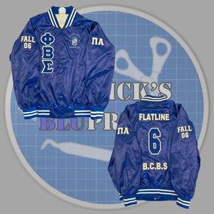 May include: A blue satin jacket with white and blue striped trim. The front features Greek letters and the text "FALL 06". The back of the jacket displays the word "FLATLINE", the number "6", and the text "B.C.B.S".