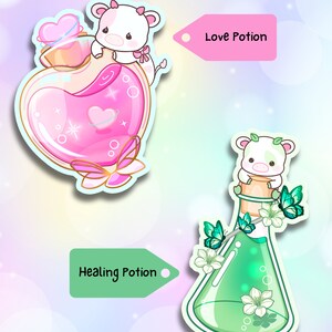 May include: Two cartoon potion bottles with cute cow characters. The pink bottle is shaped like a heart and says "Love Potion". The green bottle is a beaker and says "Healing Potion".