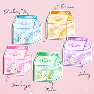 May include: Five colorful milk carton stickers with a cartoon cow and the word "ミルク" (milk) in Japanese. The stickers are labeled with the flavors: Blueberry, Banana, Strawberry, Melon, and Galaxy.