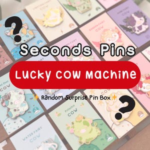 May include: A collection of colorful enamel pins featuring cow designs, displayed on cards. The text "Seconds Pins" and "Lucky Cow Machine" are visible. The pins have various themes, including "Water Fairy Cow" and "Pistachio Cow".