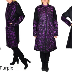 May include: Black coat with intricate purple embroidery. The coat features a button-up front, long sleeves, and a detailed floral and paisley design. The word "Purple" is visible at the bottom of the image.