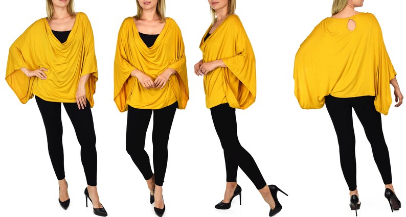 K&ouml;nnte beinhalten: Ein locker sitzendes, lang&auml;rmliges Oberteil in Senfgelb mit einem Schalkragen. Das Oberteil wird an einem Model gezeigt, das schwarze Leggings und hohe Abs&auml;tze tr&auml;gt.