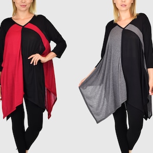 May include: Two women's tops with a color-blocked design. The top on the left is red, black, and gray. The top on the right is gray, black, and gray. Both tops have a V-neck and a long, asymmetrical hem.