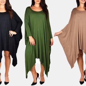 May include: Three long-sleeved, asymmetrical dresses in black, green, and brown. The dresses have a loose, flowing fit and a scoop neckline.
