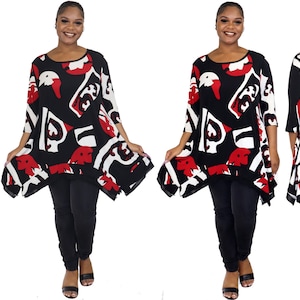 May include: A black, red, and white patterned tunic top with a slightly asymmetrical hemline. The top has a round neckline and three-quarter sleeves.