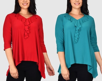 Damblus med volangkrage och asymmetrisk babydoll-tunika, perfekt för både formella och vardagliga tillfällen