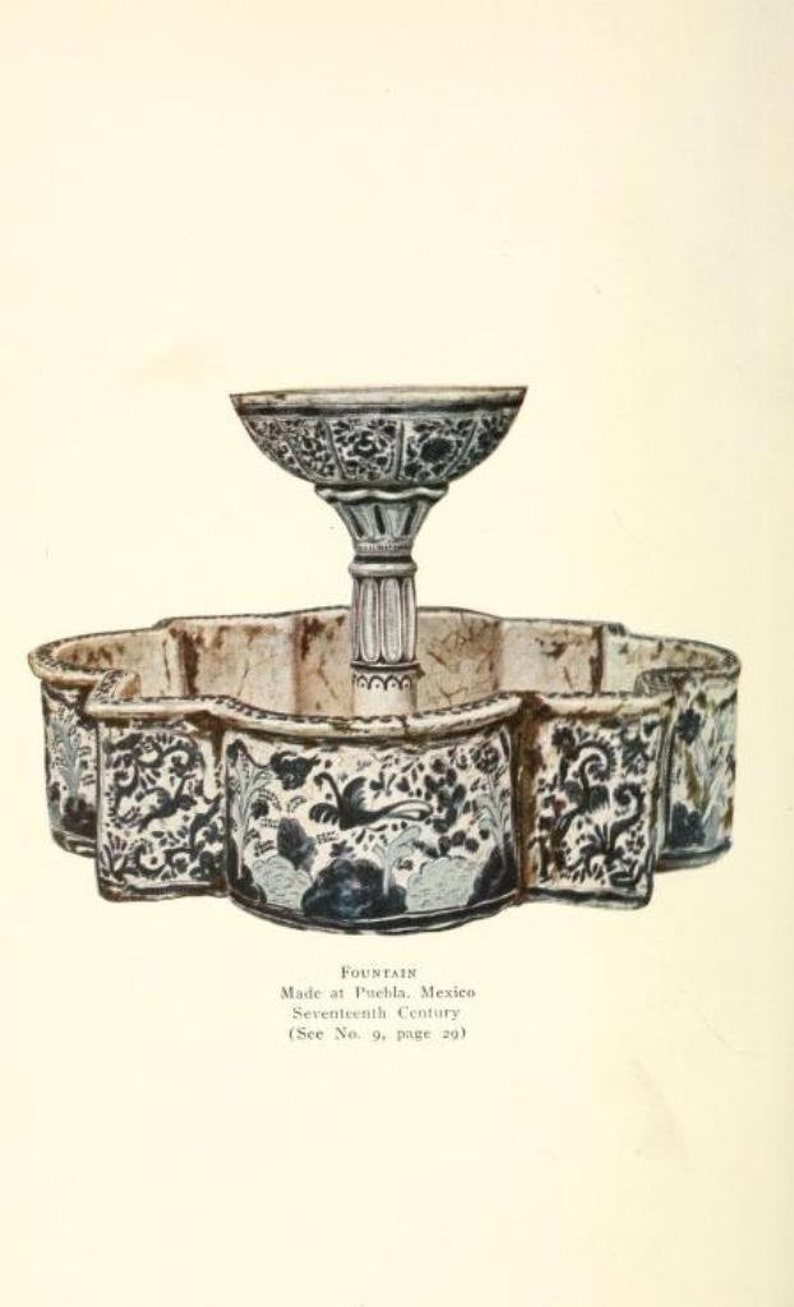 May include: A ceramic fountain with a central pedestal and a scalloped basin, decorated with blue and white floral and bird motifs. The text below reads: FOUNTAIN, Made at Puebla, Mexico, Seventeenth Century, (See No. 9, page 29).