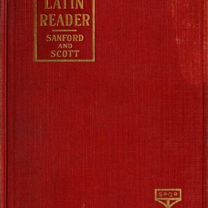 May include: A red hardcover book titled Junior Latin Reader by Sanford and Scott. The front cover features gold lettering and a small gold emblem in the bottom right corner with the letters S.P.Q.R. on a banner atop a vertical pole design.