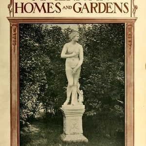 May include: A black and white magazine cover with the title "AMERICAN HOMES AND GARDENS" in a decorative font. The cover features a black and white photograph of a white marble statue of a woman standing on a pedestal in a garden.