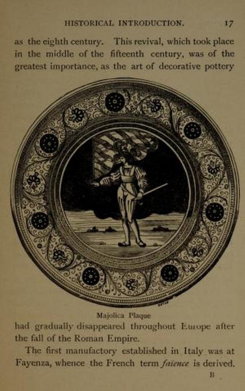 May include: A black and white illustration of a circular Majolica plaque featuring a central figure holding a sword and flag, surrounded by a decorative border of floral motifs and circular patterns, set against a page of historical text.