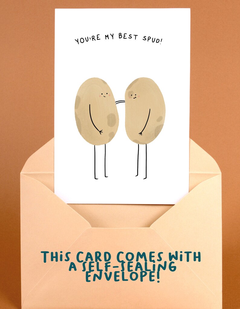 May include: A greeting card with the text "YOU'RE MY BEST SPUD!" features two cartoon potatoes with arms and legs. The card is inside a peach-colored envelope. The envelope text reads "THIS CARD COMES WITH A SELF-SEALING ENVELOPE!"
