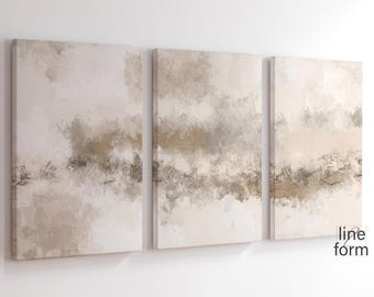 May include: A set of three abstract canvas wall art prints in a beige and brown colour scheme. The prints feature a layered, textured design with subtle brushstrokes.