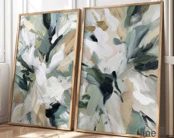 Puede incluir: Dos impresiones artísticas abstractas enmarcadas. La obra presenta pinceladas en tonos blancos, verdes, beige y negros. Los marcos son de madera clara. La esquina inferior derecha de la impresión derecha tiene el texto "Nine form".