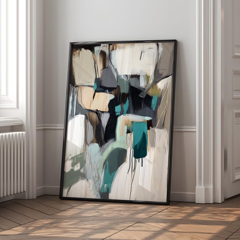 May include: Abstract painting with a black frame. The painting features a mix of white, gray, brown, and teal colors in a geometric pattern.