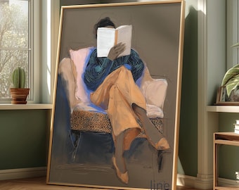 May include: An artistic framed print depicts a person seated in a chair, engrossed in a book. The person wears a blue sweater and orange pants. The chair has a leopard print seat. The artwork is set against a neutral background.