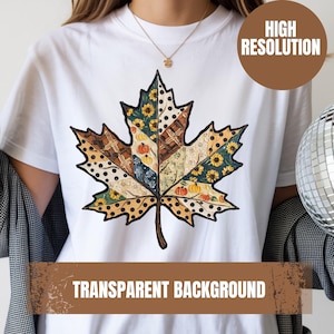 May include: A white t-shirt featuring a large, central maple leaf graphic composed of various patterned segments, including sunflowers, pumpkins, polka dots, and plaid textures in shades of orange, yellow, brown, and dark blue.