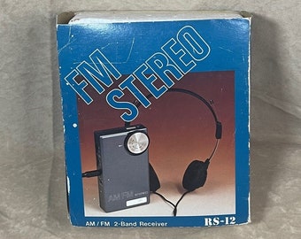 Vintage 1980s New in Box and Sealed AM/FM Portable Radio with Headphones and Original Packaging