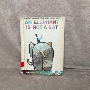 Vintage 1962 An Elephant Is Not A Cat Hardback Children&#39;s Book by Alan Tresselt and Wilbur Wheaton Illustrated by Tom Vroman
