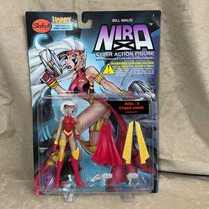 Vintage 1997 Skybolt Toyz Nira X: Cyber Angel Series II Hobby Action Figure with Detachable Cape and Plasma Cannon New in Package NIB
