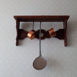 Vintage Küchen Hakenleiste aus Holz mit 5 Haken.