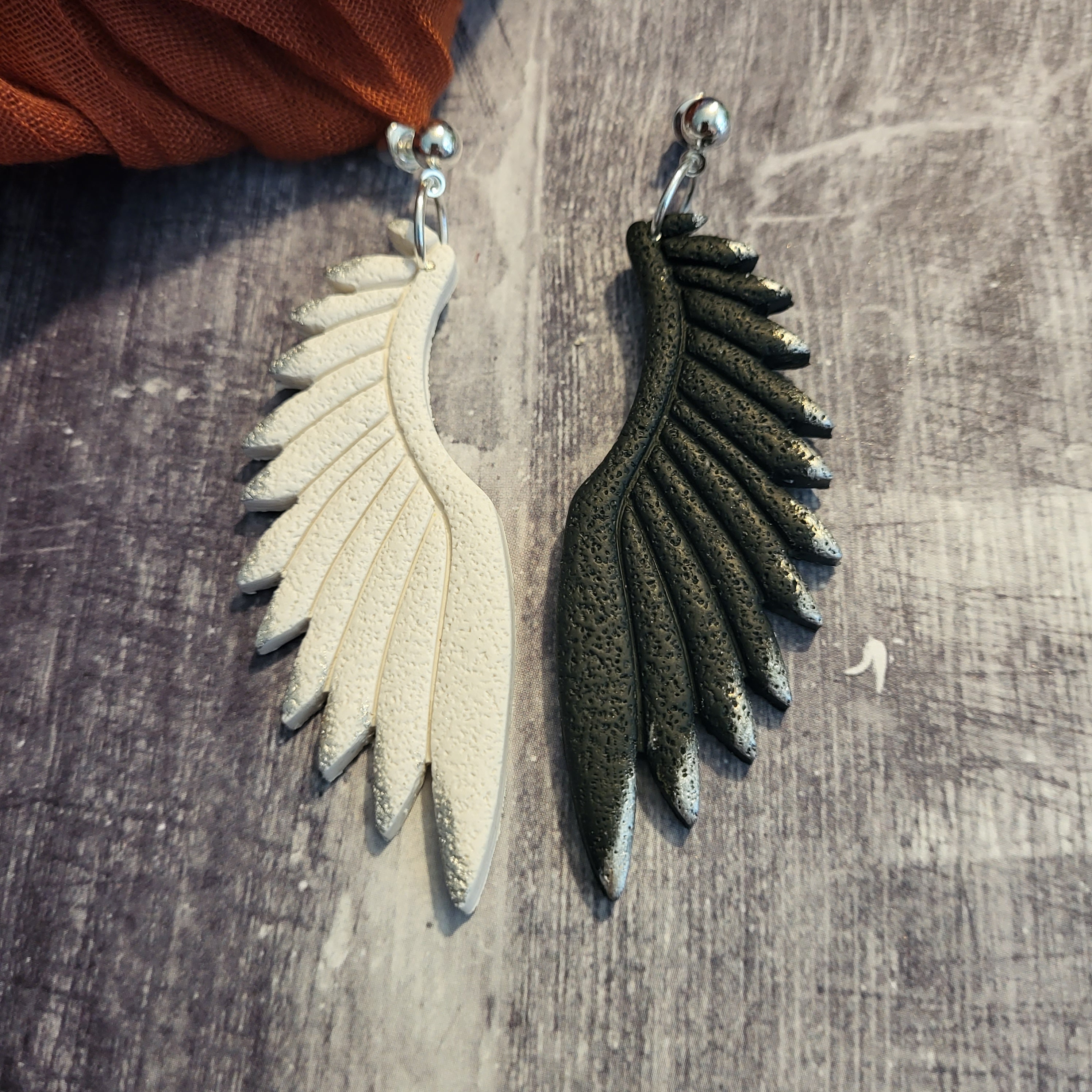 Feather wing earrings deals
