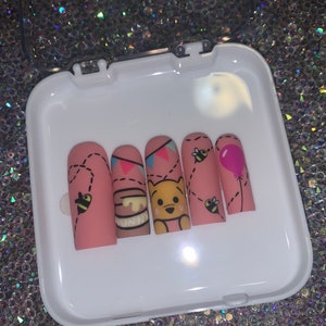 Winnie the pooh press on nails | character nails | luxurious nail art | trendy nails | handdrawn Winnie nails | gifts for her