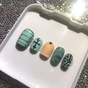 Green freestyle press on nails | luxurious nail art | trendy nails | handmade nails | gifts for her | short nails | y2k cross nails