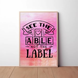 May include: Pink watercolor background with a black and white graphic that says "See the Able, Not the Label" with a heart in the middle of the word "Able".