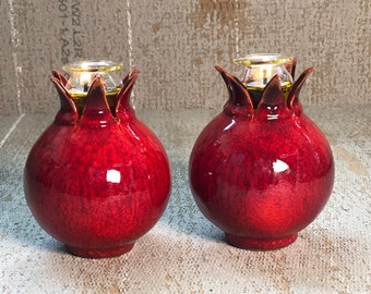 Ceramic pomegranate oil lamp.