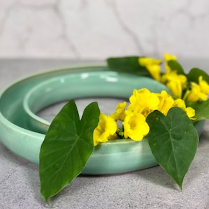 Handcrafted Pansy Ring Vases – Elegant Floral Arrangements for Every Occasion.