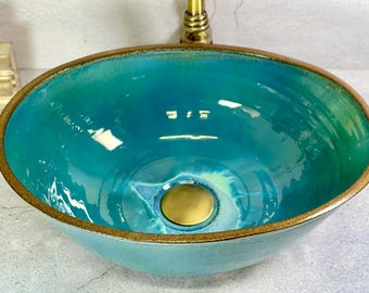 Turquoise Oval Ceramic Sink – Unique Handmade Basin with Natural Glaze Flow.
