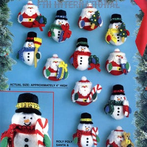 May include: A Bucilla Roly Poly Santa and Snowmen felt ornament kit featuring 12 distinct holiday characters. Each ornament is approximately 10 cm high and includes felt, sequins, beads, and embroidery floss for crafting festive decorations.