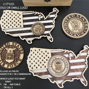 May include: Two styles of wooden US map cutouts with a choice of Army, Navy, or Air Force logos. The logos can be 3D or engraved in 1 or 2 dimensions. The map is made of wood with a brown and white striped design.