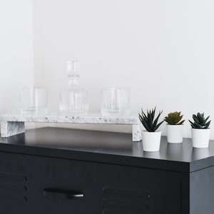 Base/Backsplash in White Carrara Marble