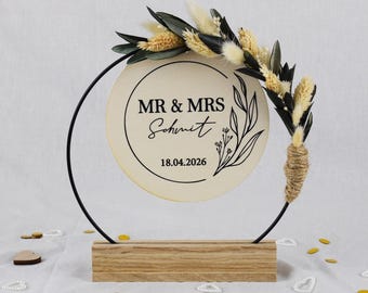 Personalized decorative ring as a wedding gift idea, with name and date as a wedding present and money gift for the bride and groom