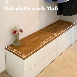 Titelbild für Holzplatten nach Maß aus Massivholz aus Eiche in Natur geölt auf einem IKEA Platsa als Beispiel. Maximale Breite sind 600 mm und die maximale Länge sind 1900 mm.