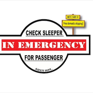 May include: Black and white sign with red text that reads "CHECK SLEEPER IN EMERGENCY FOR PASSENGER SAFETY DEPT.". A yellow sign with black text above reads "BUY 2 GET 3! Free domestic shipping!"