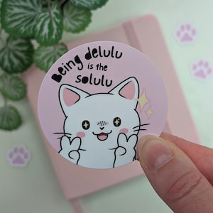 DELULU CAT Sticker, Being Delulu is the Solulu, Relatable Kitty Sticker, Cute Cat Sticker, Funny Meme Sticker, Kawaii Peace Sign Cat
