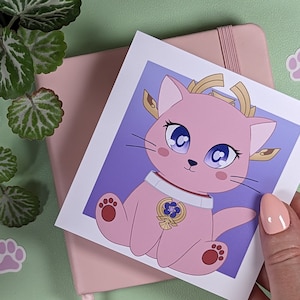 May include: A pink cartoon cat with blue eyes and a gold crown, wearing a white collar with a blue flower and gold accents. The cat is sitting on a purple background.