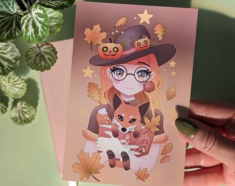 May include: A digital illustration of a witch with long blonde hair wearing a black witch hat with orange pumpkins and a green vine. She is wearing round glasses and holding a red fox in her arms. The background is a light pink with fall leaves and stars.
