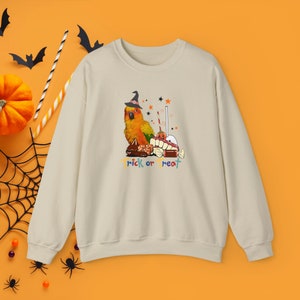 Sun Conure candy Trick-or-Treat Halloween Unisex Heavy Blend™ Crewneck Sweatshirt,sun conure Halloween sweatshirt