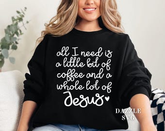 May include: Black sweatshirt with white text that reads "all I need is a little bit of coffee and a whole lot of Jesus".