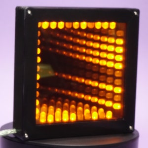 LED Infinity mirror. Endless Tunnel of Light. Desktop / Tabletop Size. Black Frame. Flashing Yellow LEDs. Unique. UK Designed & Made
