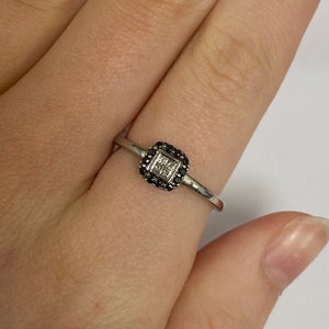 9carat white gold, black and white diamond ring