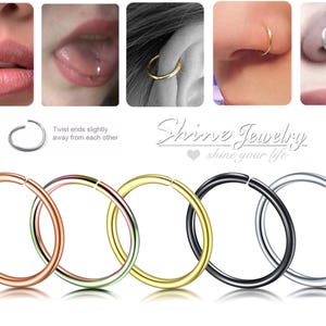 May include: A selection of hoop nose rings in colours such as rose gold, gold, black, and silver. The image also shows examples of the rings being worn in lip, tongue, ear, and nose piercings. The text "Shine Jewelry" is visible.