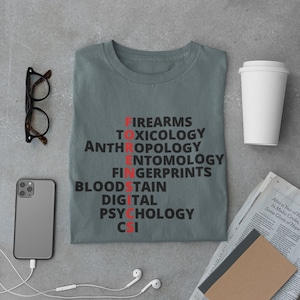 PRINT ON DEMAND** Forensic Word Unisex Heavy Cotton Tee Crime Scene csi Science Investigator Death Police leo Lettering