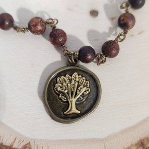 Wood beaded necklace with tree pendant, antique gold