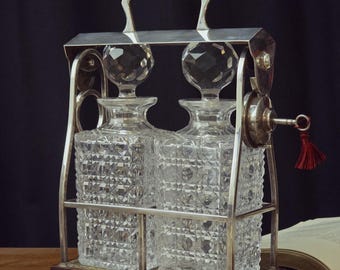 English Tantalus Silver plated , 2 x  Hobnail cut decanters, Mahogany base 1920s